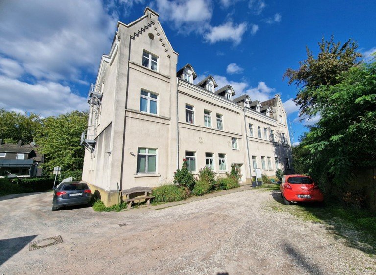 R�ckansicht Herne / Horsthausen Etagenwohnung Vermietete Eigentumswohnung mit Geschichte - Kapitalanlage in einer ehemaligen Schule
