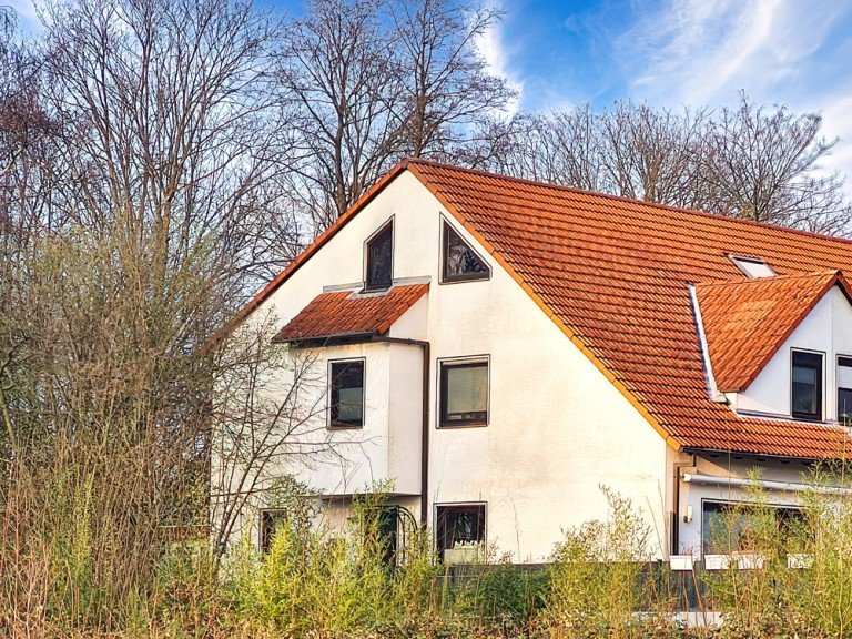 Seitenansicht Herne Reihenendhaus Exquisites Reihenendhaus in Herne-Constantin - Eine Oase der Ruhe in Premiumlage